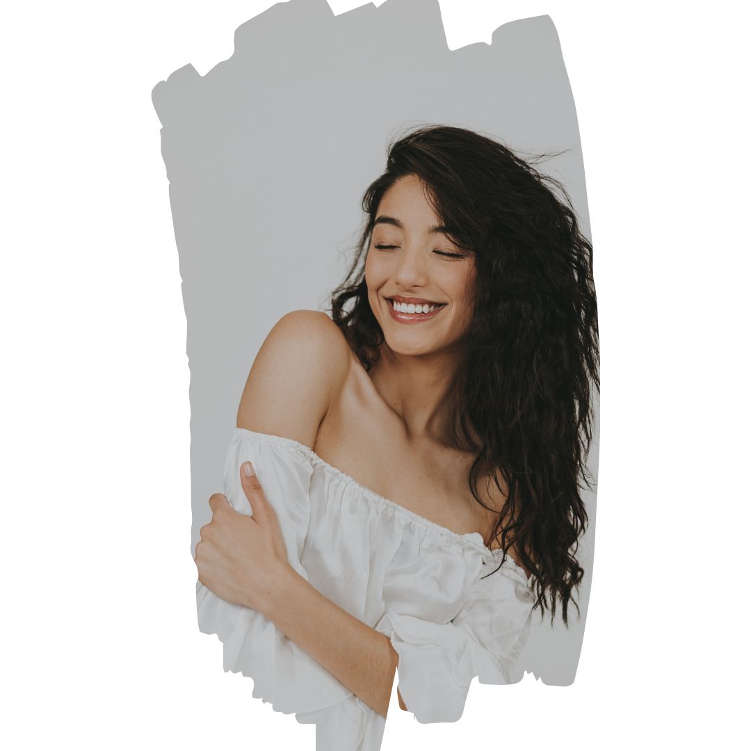 Picture of a woman smiling from self confidence