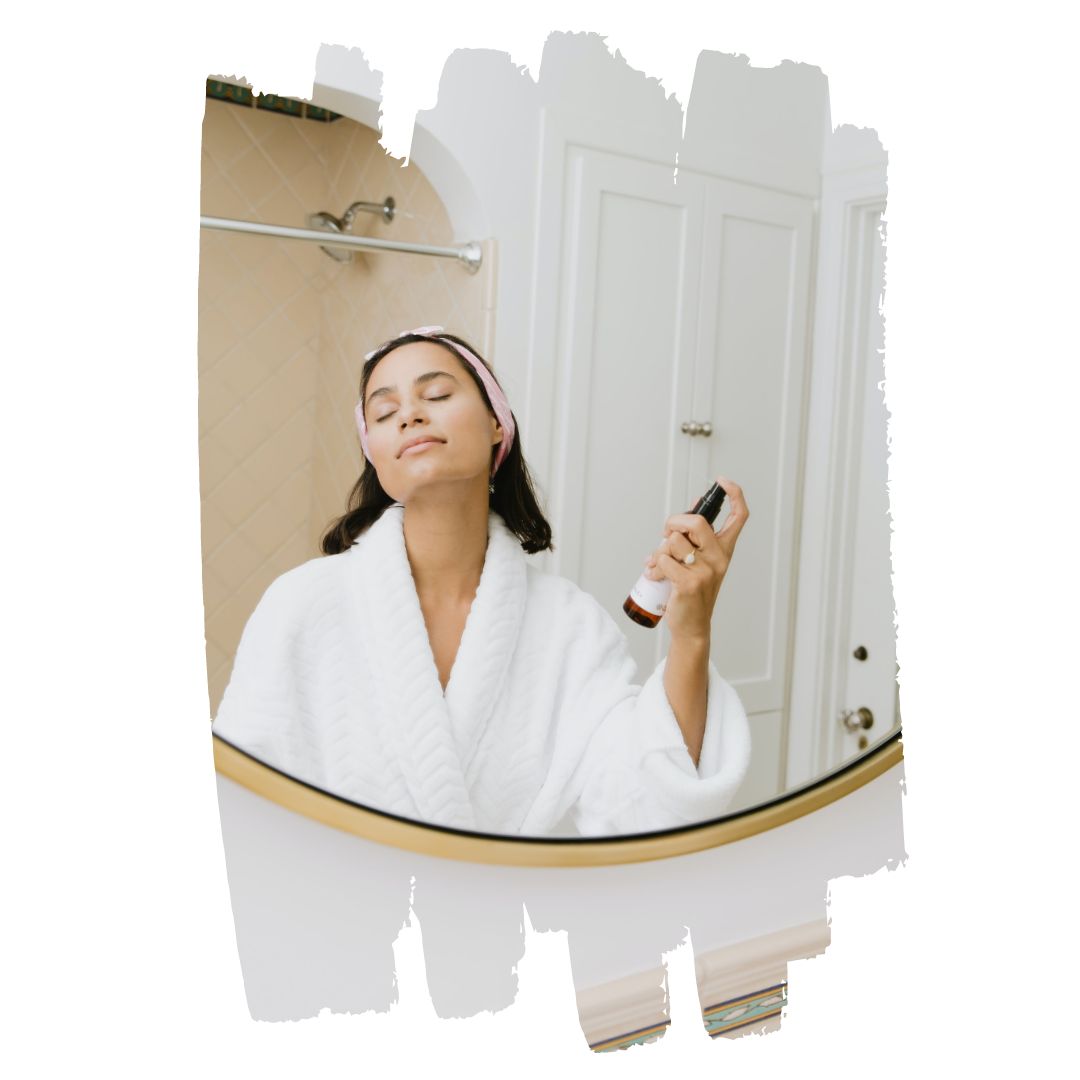 Picture of a woman practicing her skincare and self care routine