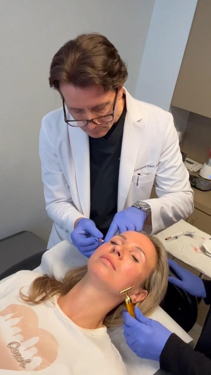 Picture of a client receiving prf under eyes with Dr. Bukov and his assistant